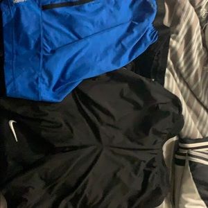 3 pairs of athletic shorts Reebok, adidas and Nike